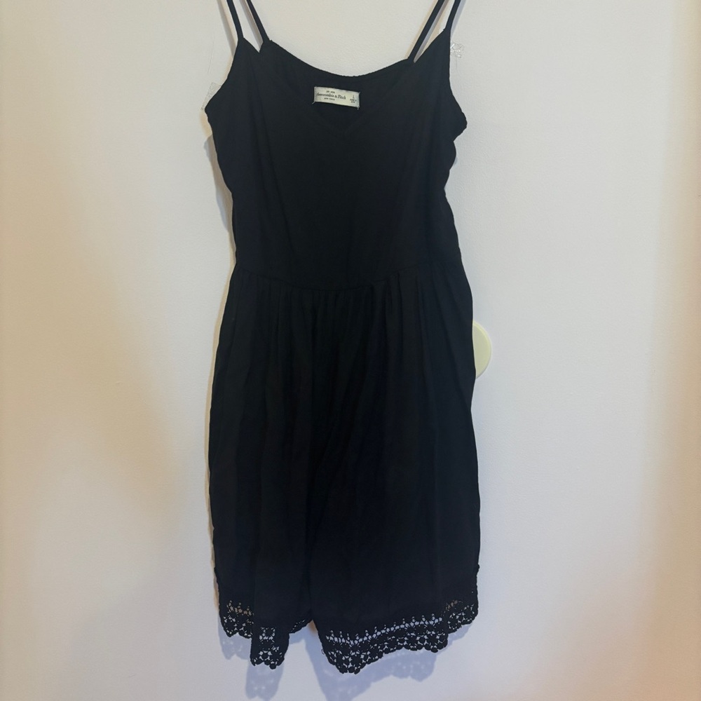 Black Sleeveless Dress with Lace Hem